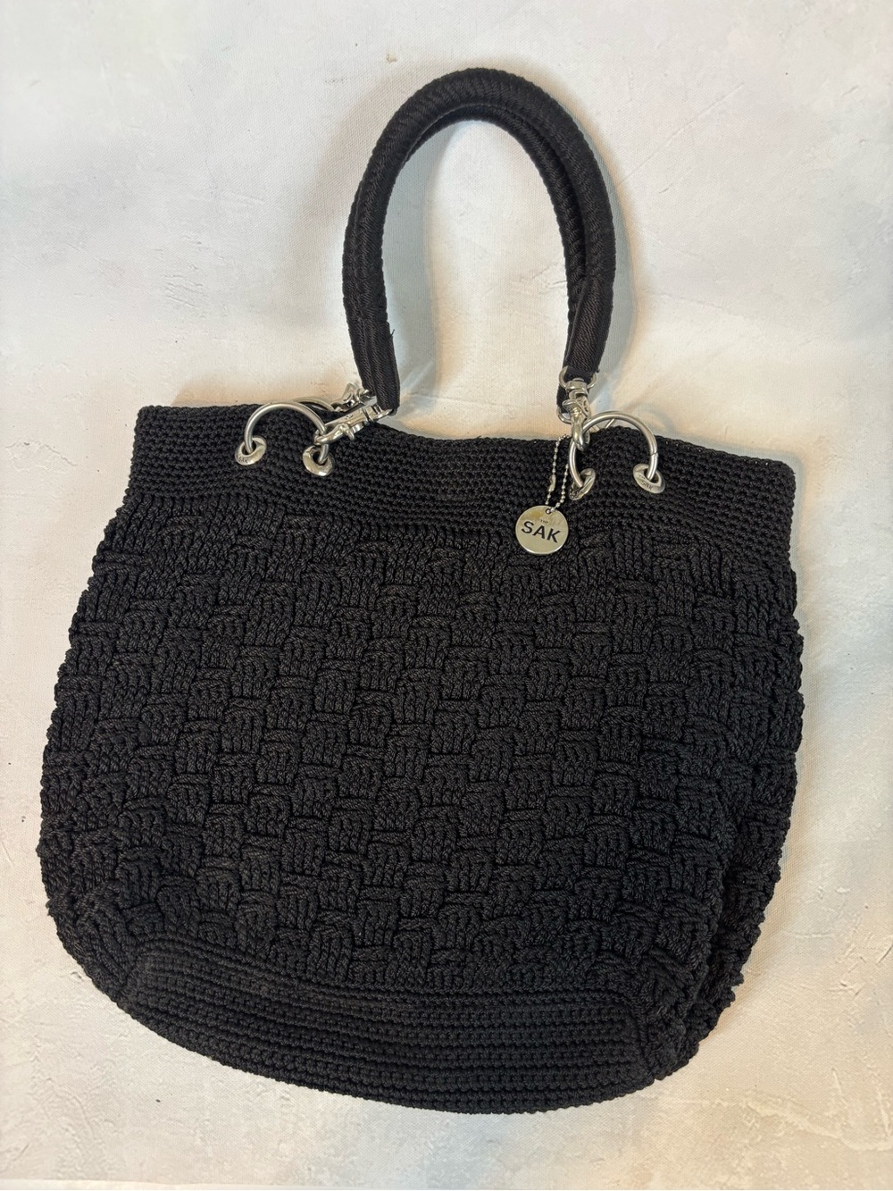 The Sak Black Crochet Tote with Silver Hardware, purse